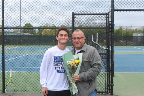 Senior tennis player and family 