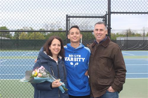 Senior tennis player and family 
