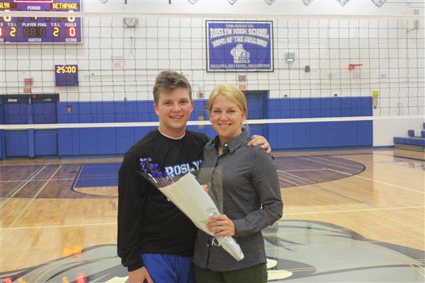 Varsity Boys Volleyball Player and Family 