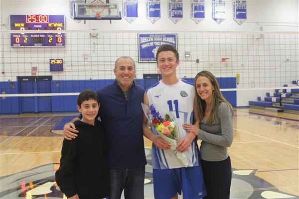 Varsity Boys Volleyball Player and Family 