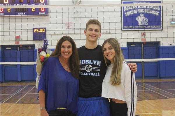 Varsity Boys Volleyball Player and Family 