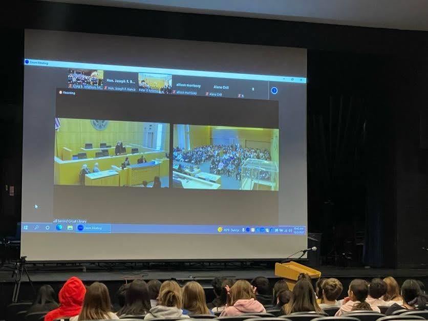 Students watching naturalization ceremony