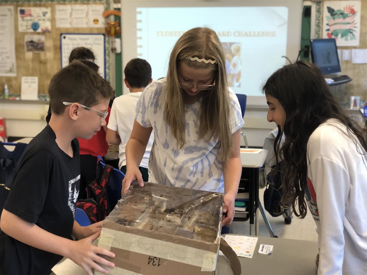 kids with cardboard games