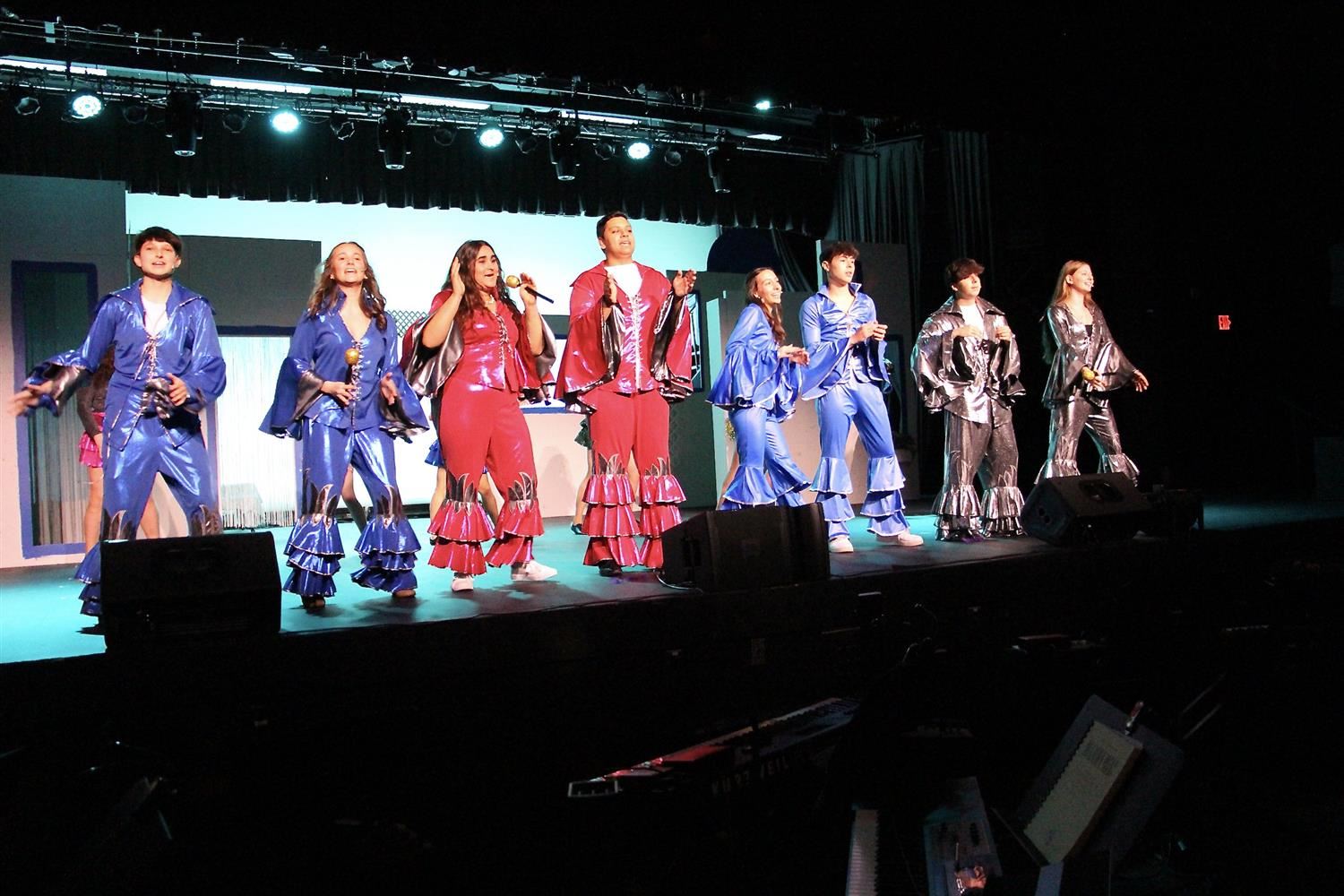  performers on stage